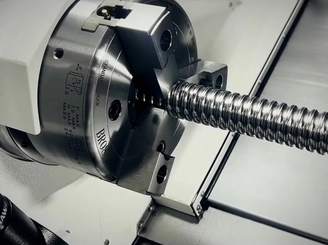 Ball screw clamped in DC Auto-Motion’s CNC machine